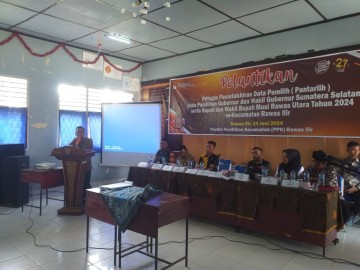Danramil 406-02/rawas ilir Diwakili Babinsa Serma Endang permana Hadiri Pelantikan PPK Se-kec rawas ilir dalam rangka pilkada kab musim rawas utara 2024.