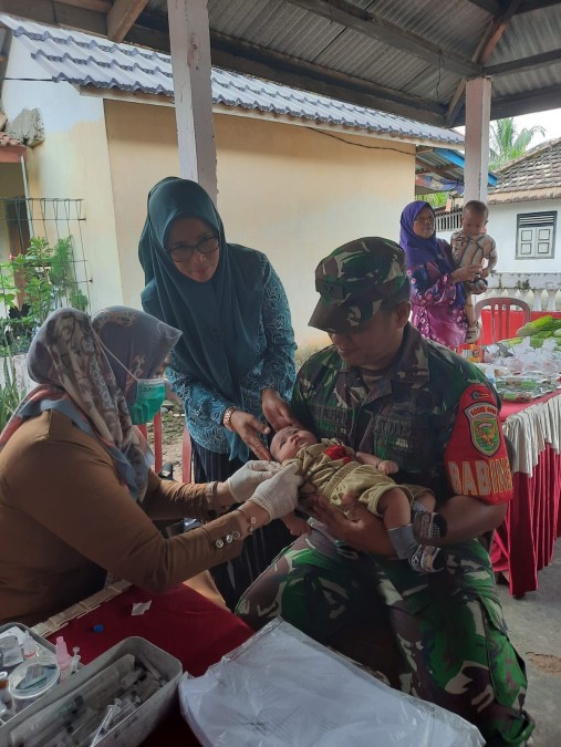 Kepedulian Kesehatan Balita Babinsa Koramil 406-03/rupit Dampingi Kegiatan Posyandu