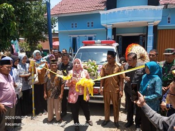 Babinsa Peltu Dedi Afrizal Hadiri Acara Penyerahan Ambulans dan Seragam Sekolah oleh Bupati Musi Rawas