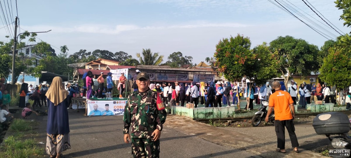 Ciptakan Wilayah Koramil 406-10/ Linggau Timur aman Dan kondusif sertu martan dan Serda Jon peri Pantau kampanye calon walikota