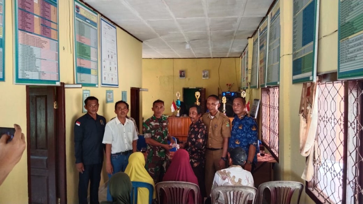 Serka Dqi Bambang Irawan Hadiri Undangan Pembagian BLT dan Kegiatan Titik 100% Pembangunan Infrastruktur Desa Trisakti