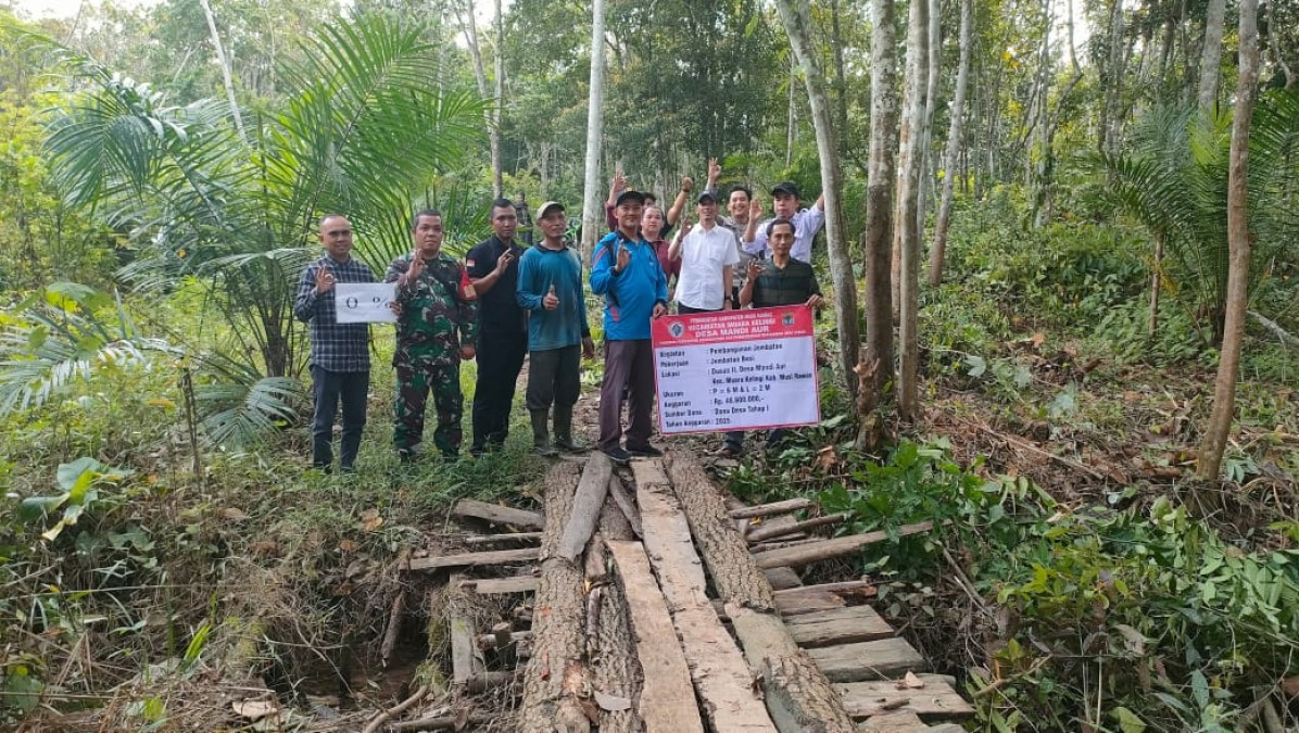 Babinsa Serda Rilly Apriansyah Hadiri Penetapan Titik Nol Proyek Infrastruktur di Desa