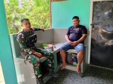 Babinsa 406-03/Rupit Laksanakan Komsos di Desa Muara Batang Empu