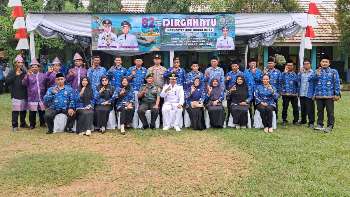 DANRAMIL 406-09/TERAWAS LETTU INF ABDI NUSA HADIRI UPACARA HUT KE-82 KABUPATEN MUSI RAWAS DAN RAKOR TINGKAT KECAMATAN DI SMP NEGERI SUKAMULYA