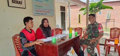 Babinsa Koramil 406-09/Terawas Laksanakan Komsos di Kelurahan Selangit, Tekankan Pentingnya Keamanan dan Kemajuan Wilayah