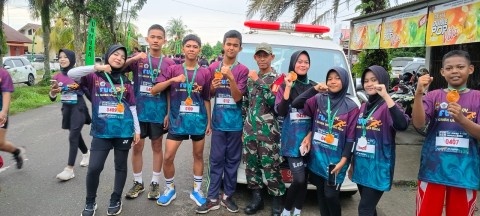 BABINSA KORAMIL 406-06/TUGUMULYO MONITOR KEGIATAN FUN RUN GO GREEN UNMURA 2026